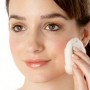 womanapplyingtoner woman applying facial toner